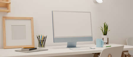 3D rendering, computer device with mock-up screen on white table with stationery and decoration in minimal room, 3D illustration, side viewの写真素材