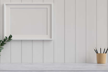 Mock-up frame decorated on white plank wall and pencils in the cup on marble desk, 3D rendering, 3D illustrationの写真素材