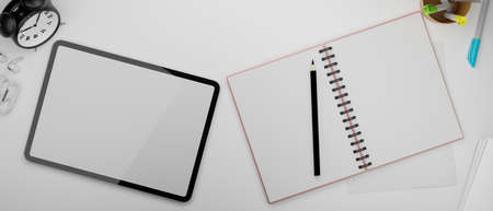 Digital tablet with mock-up screen and opened blank notebook on the table, 3D rendering, 3D illustrationの写真素材