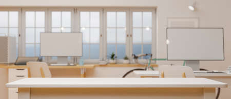 Empty white counter in office room with computer and supplies in the background, 3D rendering, 3D illustrationの写真素材