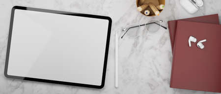 Digital tablet with mock-up screen, accessories and books on mar blue table, 3D rendering, 3D illustrationの写真素材