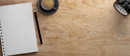 Blank notebook and pencil on wooden table with coffee cup and clock, 3D rendering, 3D illustration,...