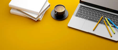 Laptop, coloured pencils, coffee cup and stack of books on yellow background, 3D rendering, 3D illustrationの写真素材