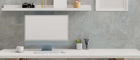 Blue pastel computer monitor with mock-up screen on white table in loft office room, 3D rendering, 3D illustrationの写真素材