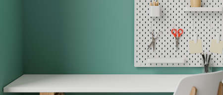 Stylish working space with white table, supplies, tools and stationery on shelf decorated on turquoise wall, 3D rendering, 3D illustrationの写真素材