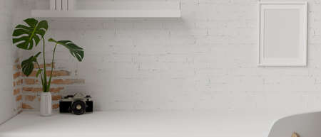 Minimal workspace with camera and plant pot on whitstable with shelf and frame decorated on brick wall, 3D rendering, 3D illustrationの写真素材