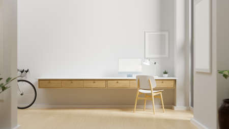 Minimal home working space with computer on the table, mock-up frame on the wall and bicycle in the room, 3D rendering, 3D illustrationの写真素材