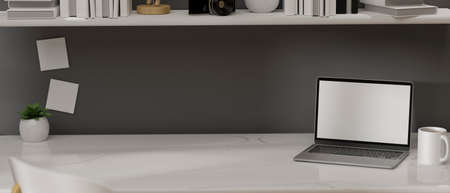 Laptop with mock-up screen on the table in home office desk, 3D rendering, 3D illustrationの写真素材