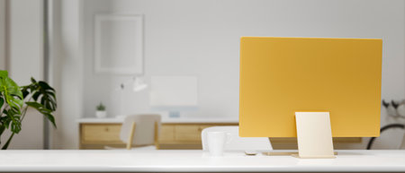 Yellow pastel monitor on white table in living room, 3D rendering, 3D illustration, front viewの写真素材