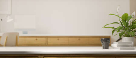 White desk with copy space, mug, books and plant pot in office room, 3D rendering, 3D illustrationの写真素材