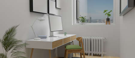 Minimal home office room with computer desk beside the window, frame and plant pots, 3D rendering, 3D illustrationの写真素材