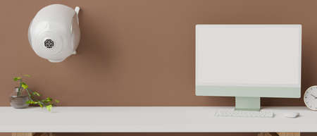 Computer monitor with mock-up screen on white table with decorations and speaker, 3D rendering, 3D illustrationの写真素材