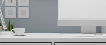 Computer desk with monitor, keyboard, coffee cup and decorations, 3D rendering, 3D illustrationの写真素材