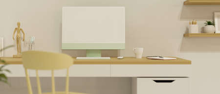 Computer device on the table in home working space with decorationsの写真素材