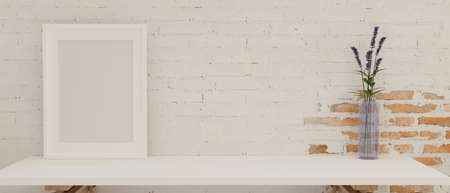 Mock-up frame and flower vase on white table with brick wall background, 3D rendering, 3D illustrationの写真素材