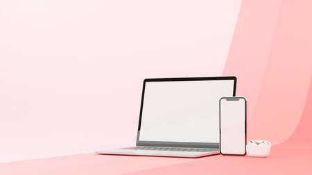 Laptop and smartphone with mock-up screen and wire less earphones isolated on pink pastel background, 3D rendering, 3D illustrationの写真素材