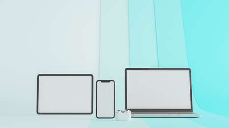 Digital devices with laptop, tablet and smartphone with mock-up screen isolated on blue background, 3D rendering, 3D illustrationの写真素材