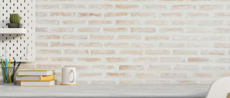 Mock-up workspace with stationery, copy space, decorations and brick wall background, 3D rendering, 3D illustrationの写真素材