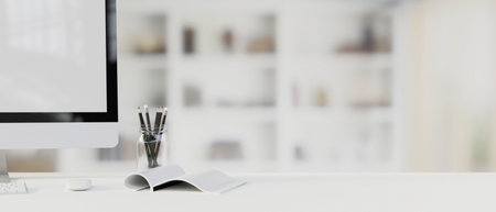 Workspace with computer monitor, stationery and copt space on the table with blurred background, 3D rendering, 3D illustration, close-upの写真素材