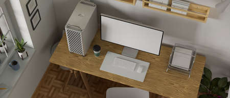 Loft workspace with desktop computer, stationery on the desk and copy space, 3D rendering, 3D illustrationの写真素材