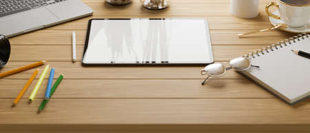 Cropped shot of study table with mock up tablet with stationery on wooden table, 3D rendering, 3D illustrationの写真素材