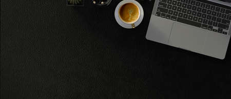 Top view of modern workspace with laptop and copy space, 3D rendering, 3D illustrationの写真素材