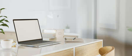 Modern workspace with mock up laptop computer, 3D rendering, 3D illustrationの写真素材