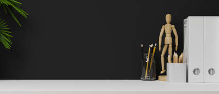 Copy space for product display on white table with decorations and black wall, modern work space interior, 3d rendering, 3d illustrationの写真素材