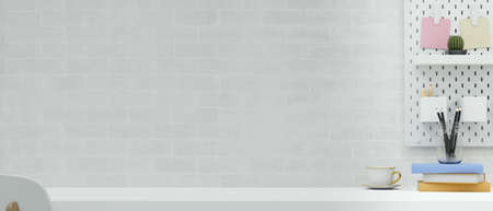 Simple workspace with stationery on the desk and shelf on brick wall background, 3D rendering, 3D illustrationの写真素材