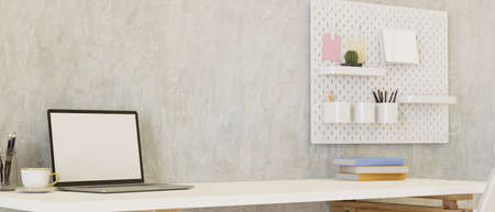 Minimal workspace with laptop, stationery on the desk and shelf on loft wall, copy space, 3D rendering, 3D illustrationの写真素材