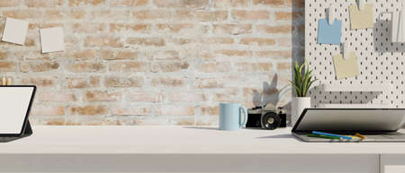 White wooden table with copy space, brick wall and office supplies 3d rendering, 3d illustrationの写真素材