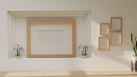 Minimal room and picture frame design for product display with plants, wooden floor and white wallpaper 3D rendering, 3D illustrationの写真素材