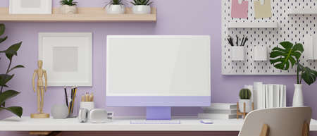 Work space in purple wallpaper design with desktop computer, stationary, decoration stuff on the desk and copy space 3D rendering, 3D illustrationの写真素材