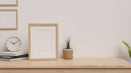 Minimal home interior with copy space for product display and frames mock-up on wooden table and decoration, 3D rendering, 3D illustrationの写真素材