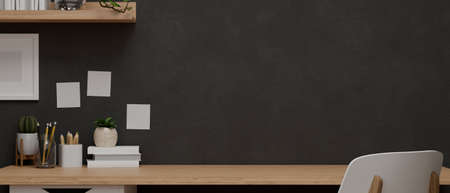 Modern working space designed with black wallpaper, wooden table for product display, stationary and decoration. 3D rendering, 3D illustrationの写真素材