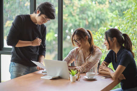 Team of business analysts discussing about financial report in the meeting room, suit for business contentの写真素材