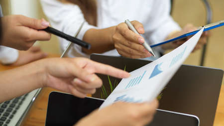 Business team discuss and vote on the next marketing campaign plan, teamwork, colleagueの写真素材