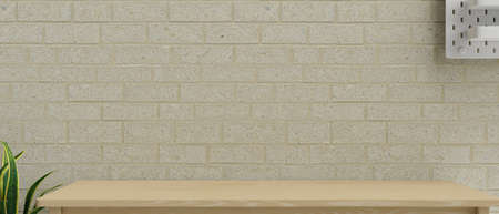 Wood table top with copy space, wooden counter for product display with light brick wall, indoor...