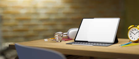 Mockup blank white screen tablet with keyboard and copy space on wooden workspace at home, blur modern brick wall, 3d rendering, 3d illustrationの写真素材