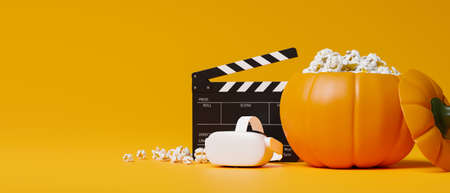 Halloween movie night with virtual reality movie, vr headset, popcorn in pumpkin bucket, movie clapper board, yellow background, 3d rendering, 3d illustrationの写真素材