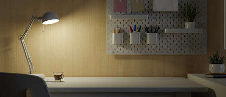 Working place of college student, workspace in apartment, copy space on table, dark room, light from table lamp, low light, 3d rendering, 3d illustrationの写真素材