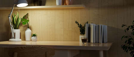 Copy space in modern home workspace, wooden working desk with copy space for display your work, decorations, wood wall, at night, 3d rendering, 3d illustrationの写真素材