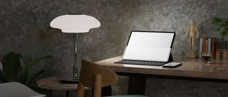 Closeup, dark modern hipster working space, grunge polished loft wall, digital tablet mockup on marble table, light from table lamp, home decorations, 3d rendering, 3d illustrationの写真素材