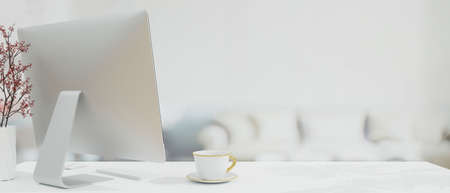 Stylish workspace with modern computer in backside on white tabletop with space for montage your product, blurred living room background, 3d rendering, 3d illustrationの写真素材