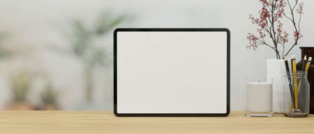 Mock up of digital tablet blank screen template stand on wooden tabletop with decor and space for montage your product or text, 3d rendering, 3d illustrationの写真素材