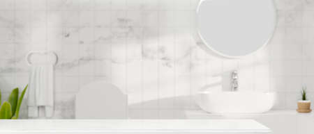 Mock-up space on white tabletop for montage spa or bath products over stylish white marble bathroom...