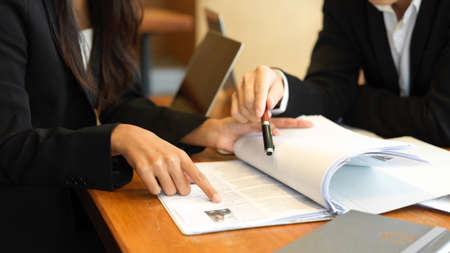 Cropped shot of business colleagues looking at resume for new employment. Human resources teamの写真素材