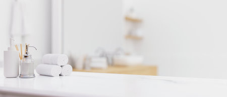 White table top or counter top with shampoo bottles, hand towels, toiletries over blurred modern bright white bathroom interior. 3d rendering, 3d illustrationの写真素材