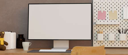 Close-up of a teen's home working desk, Mockup of a modern computer blank screen on a table with...
