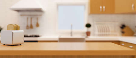 Modern luxury wooden kitchen countertop with toaster and space for montage over blurred furnished home kitchen interior in background. 3d rendering, 3d illustrationの写真素材
